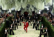The Met Gala’s red (well, cream) carpet opens, featuring long clusters of white florals