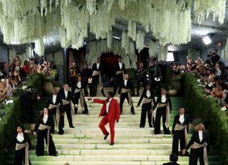 The Met Gala’s red (well, cream) carpet opens, featuring long clusters of white florals