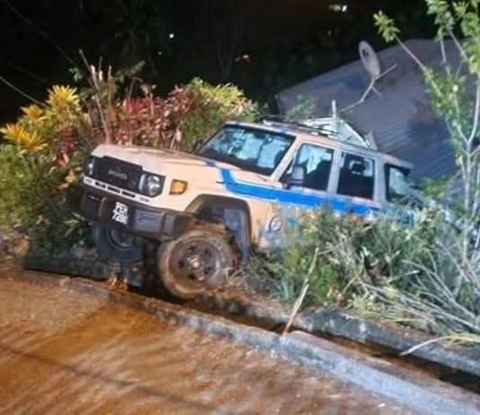 Police van crashed off roadway at Upper Blanchisseuse