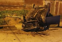 Vehicle Flips Over on Diego Martin Main Road