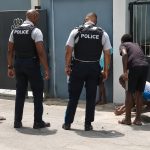 Heartwarming Moment Captured as Police Engage with Youths in Game of Marbles