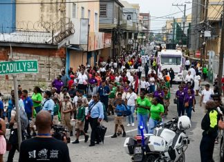 Corpus Christi Procession Proceeds Peacefully Under Police Escort Following Disrupted Peace March