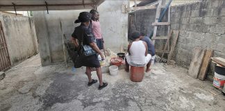 Police Connect with Residents During Sea Lots Community Walk-About