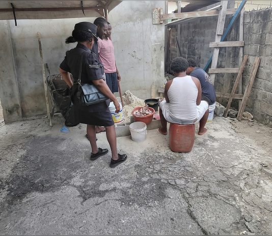 Police Connect with Residents During Sea Lots Community Walk-About