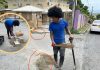 Resident Repairs Hazardous Schoolfront Potholes Himself After Officials Ignore His Pleas