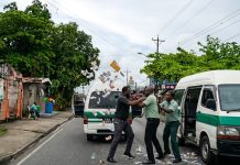 Green Band Maxi Drivers Fight After Reckless Driving Incident on Southern Main Road