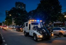 Motorists question towing as Independence activities increase city parking demand.