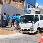 WASA truck gets stuck while navigating badly damaged roadway