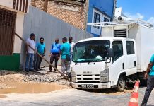 WASA truck gets stuck while navigating badly damaged roadway