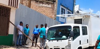 WASA truck gets stuck while navigating badly damaged roadway