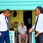 Alibocas, Premchand Deliver Wheelchair to Corinth Resident