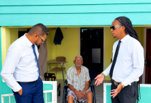 Alibocas, Premchand Deliver Wheelchair to Corinth Resident