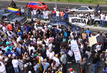 Caracas demonstrators rally after Machado blocked from returning to Venezuela