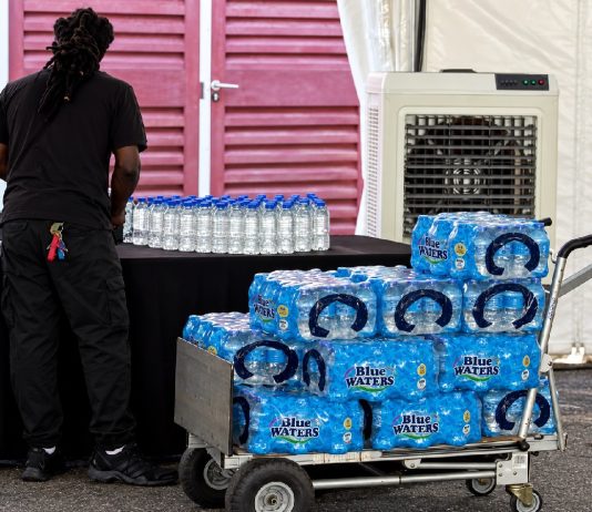 Unlabelled water bottles spark controversy over alleged politically motivated instructions.