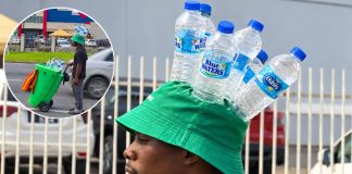 Piarco Water Vendor Gets Attention With Creative Bottle Hat