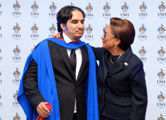 **Prime Minister Kamla Persad-Bissessar was a proud mother on Thursday as her on